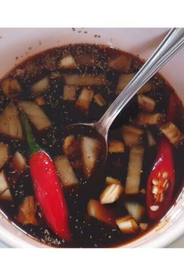 bowl of soy sauce vinegar dipping sauce
